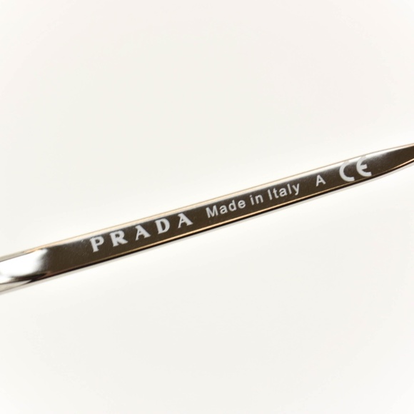 PRADA: Silver, Metal & Logo Sunglasses (po) - Picture 6 of 8